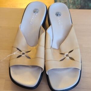 Clarks Women's Cream Mules with Cutout Design